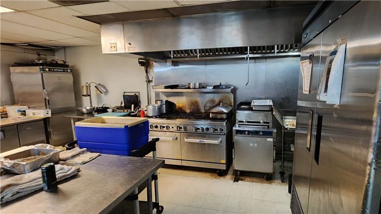 People cheering whine glasses at a table