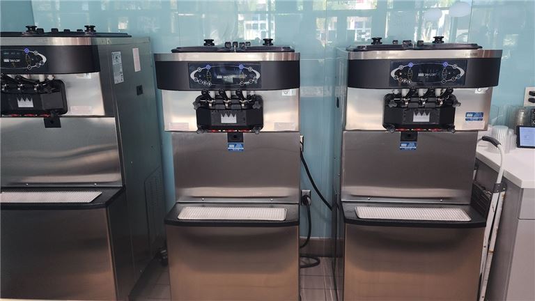 People cheering whine glasses at a table