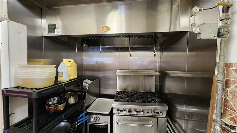 People cheering whine glasses at a table